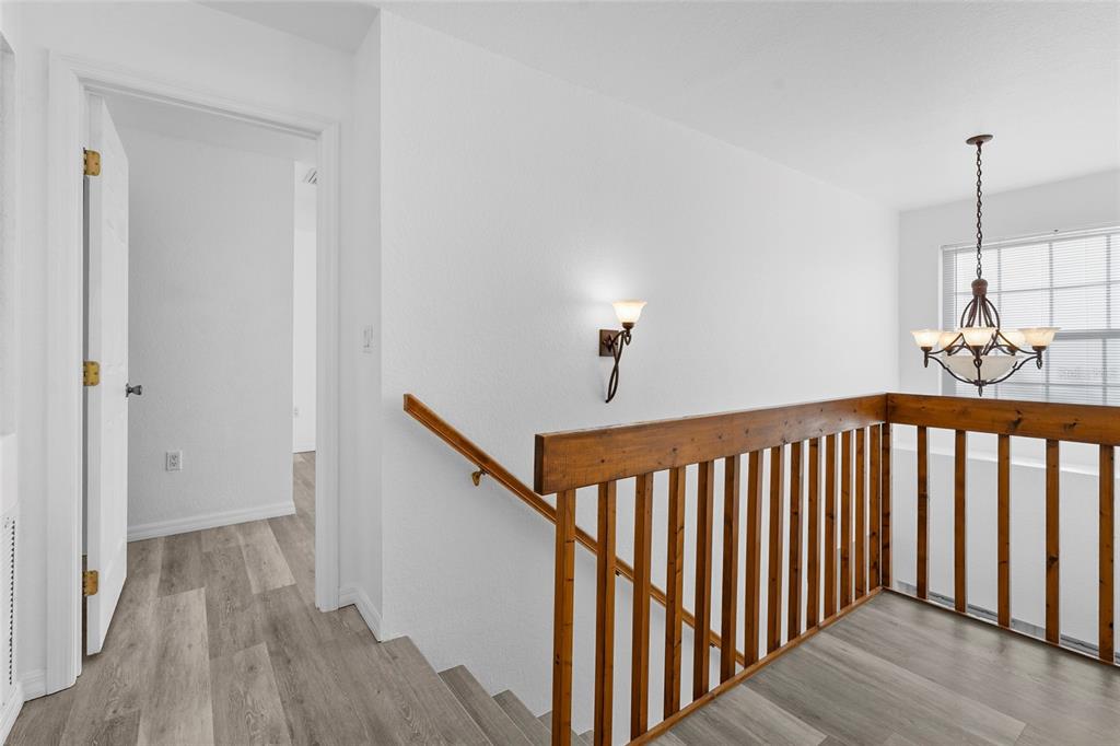 23655 Jennings Road Myakka City, FL 34251 - Photo 12 of 43 a view of hallway with wooden floor