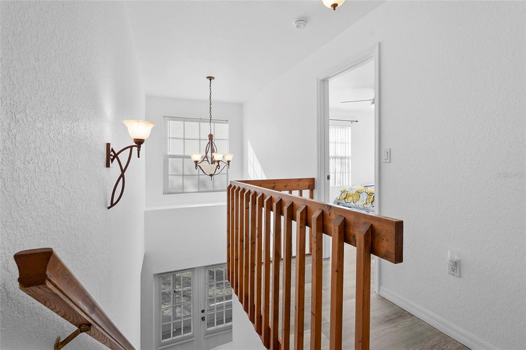 23655 Jennings Road Myakka City, FL 34251 - Photo 38 of 43 a view of entryway and hall with wooden floor