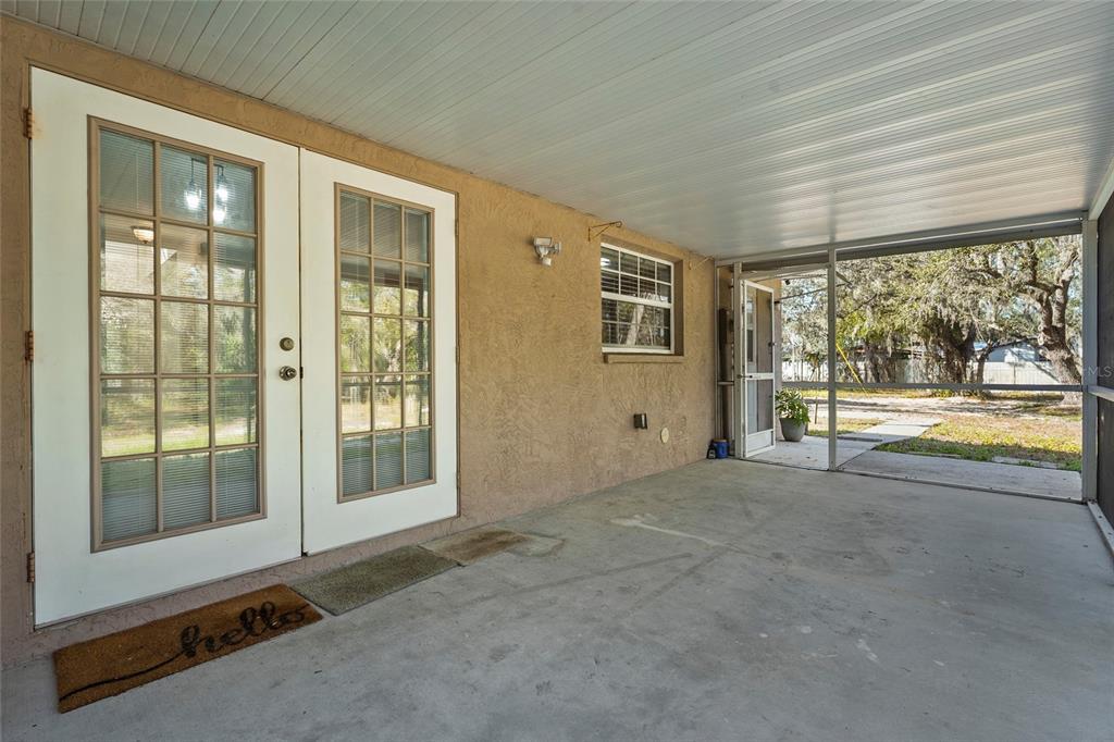 23655 Jennings Road Myakka City, FL 34251 - Photo 43 of 43 a view of an empty room with wooden floor and a window