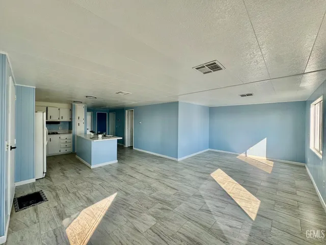 a view of a kitchen with a sink