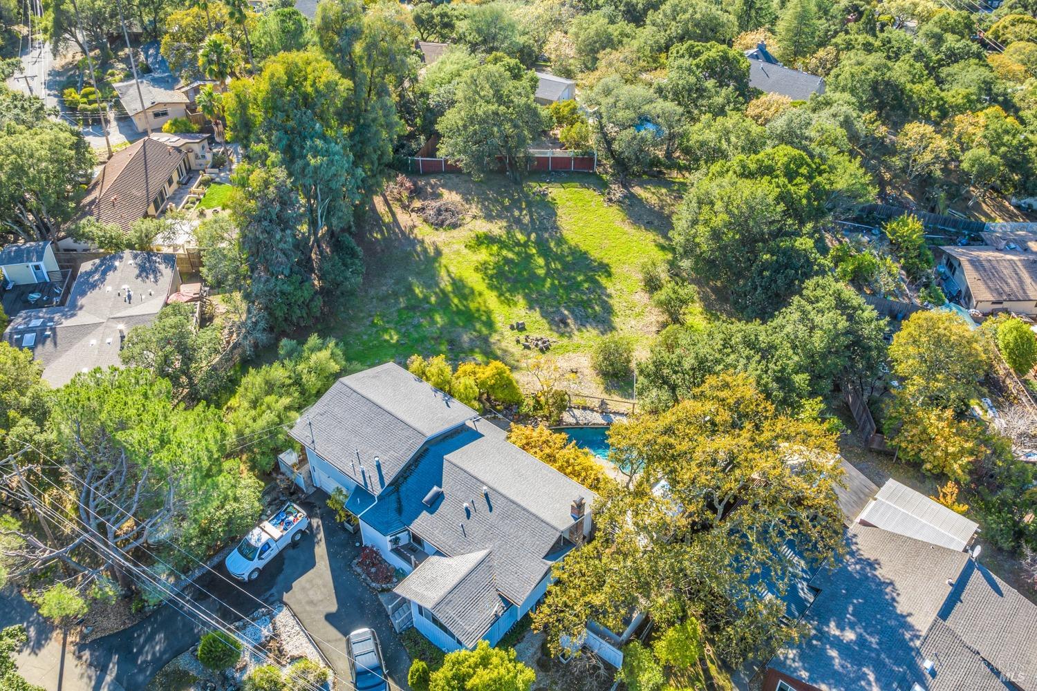 1195-1197 Alberca Road Sonoma, CA 95476 - Photo 14 of 23 an aerial view of a house with swimming pool and garden space