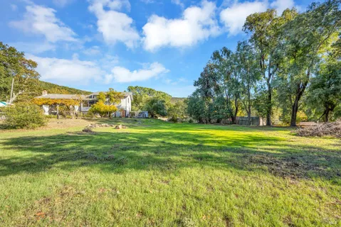 a view of swimming pool is middle and garden