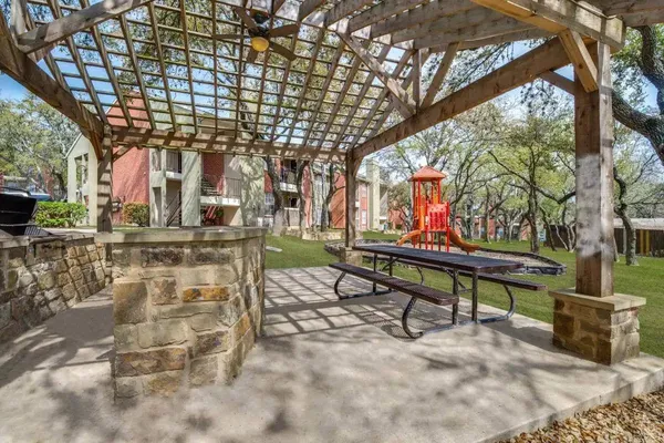 a view of a bench in the patio