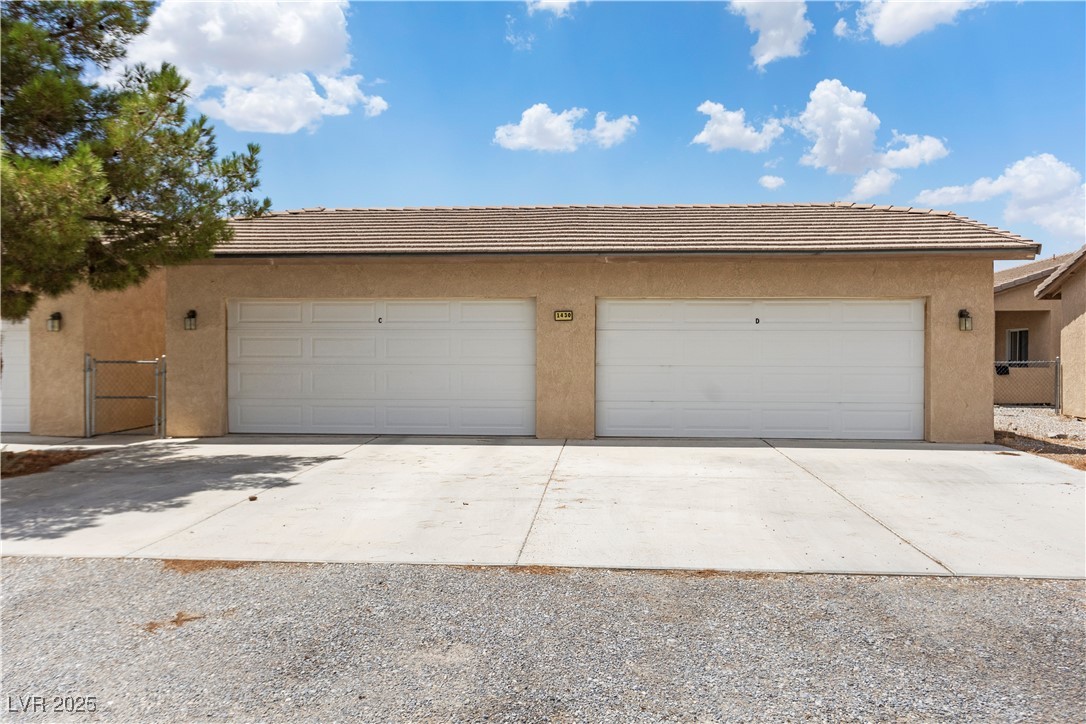 1430 Star Road Pahrump, NV 89048 - Photo 3 of 32 Garage featuring driveway