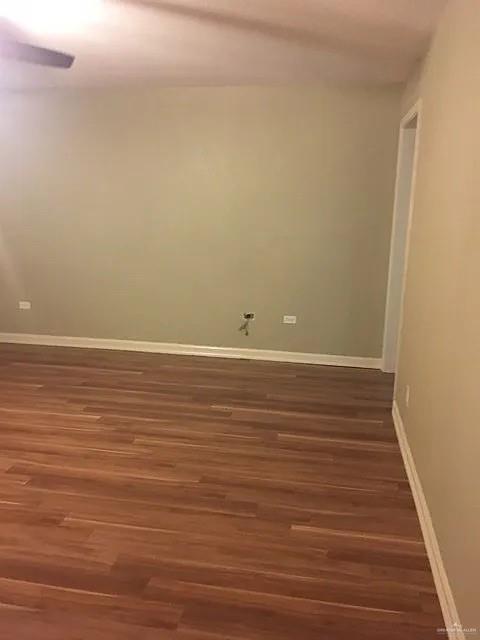 413 Uvalde Avenue McAllen, TX 78503 - Photo 12 of 20 a view of an empty room with wooden floor