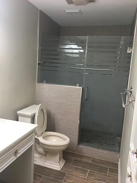 413 Uvalde Avenue McAllen, TX 78503 - Photo 15 of 20 a bathroom with a toilet and a shower