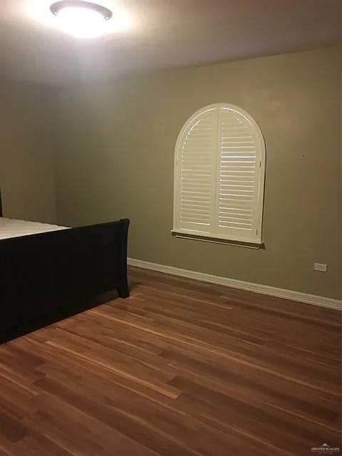 413 Uvalde Avenue McAllen, TX 78503 - Photo 17 of 20 a view of a room with wooden floor and windows