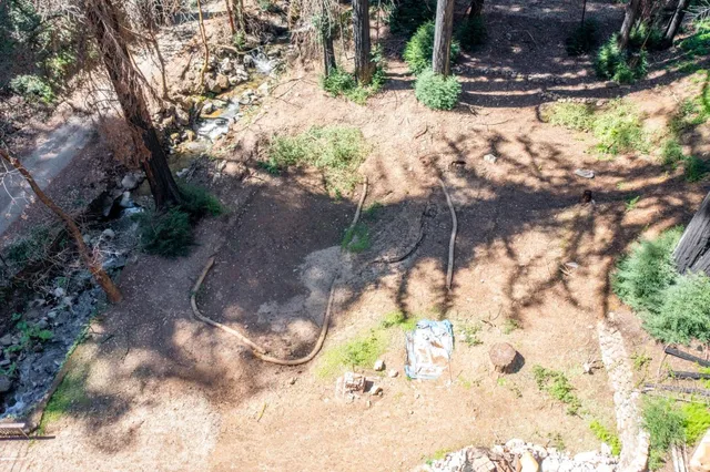 a backyard of a house with lots of green space
