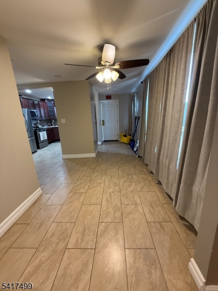 335 Hobson Street Newark, NJ 07112 - Photo 24 of 29 a view of a livingroom with a chandelier