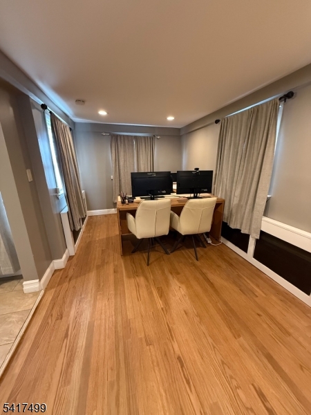 335 Hobson Street Newark, NJ 07112 - Photo 9 of 29 a view of living room with furniture and wooden floor