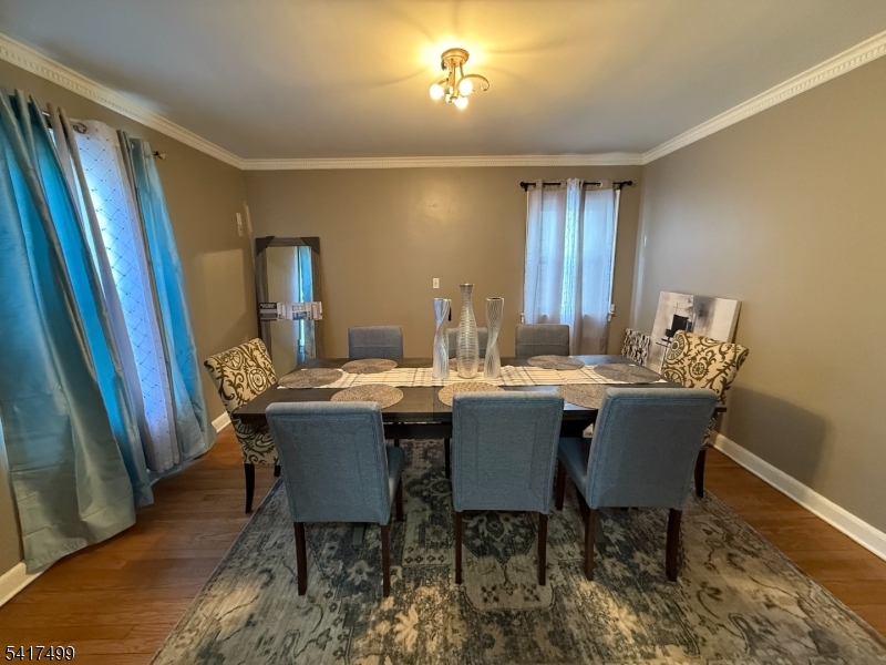 335 Hobson Street Newark, NJ 07112 - Photo 10 of 29 a view of a dining room with furniture