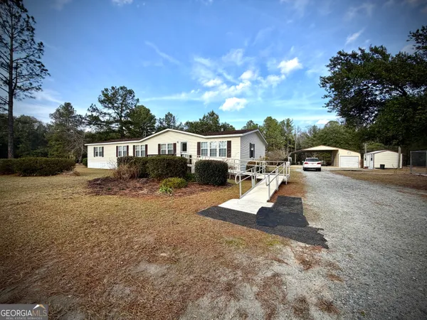 a view of a house with entertaining space