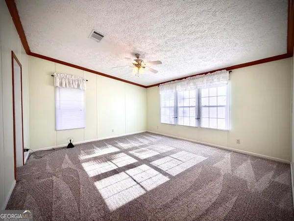 a bathroom with a bathtub and a sink