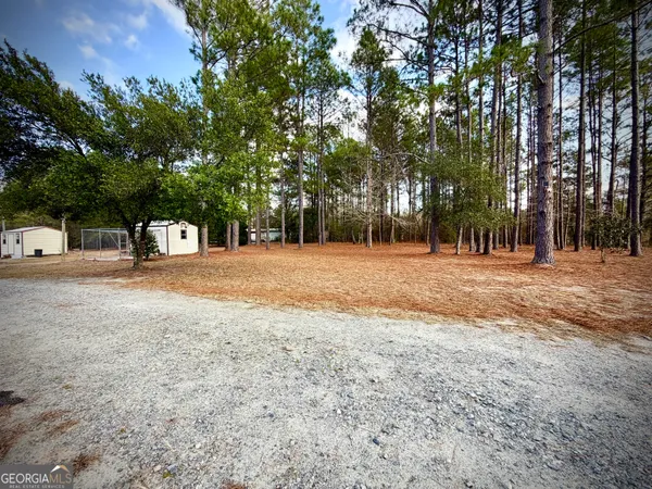 a view of road with trees