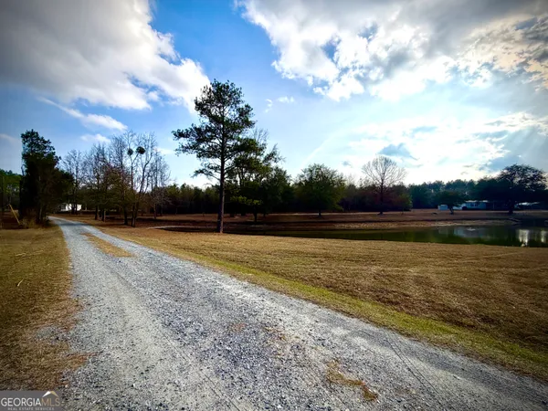 a fire hydrant in the middle of a yard