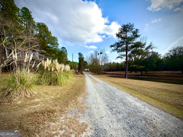 a bedroom with furniture and window
