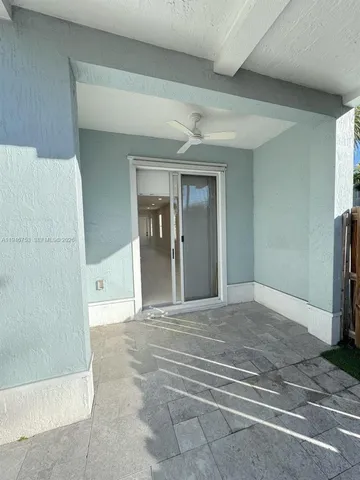 a bathroom with a sink and shower