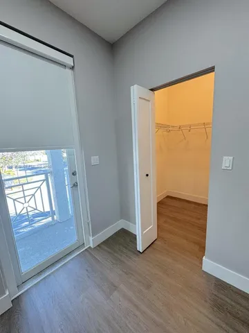 a bathroom with double vanity sink and mirror