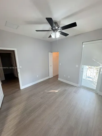 a view of a house with pool porch and a yard