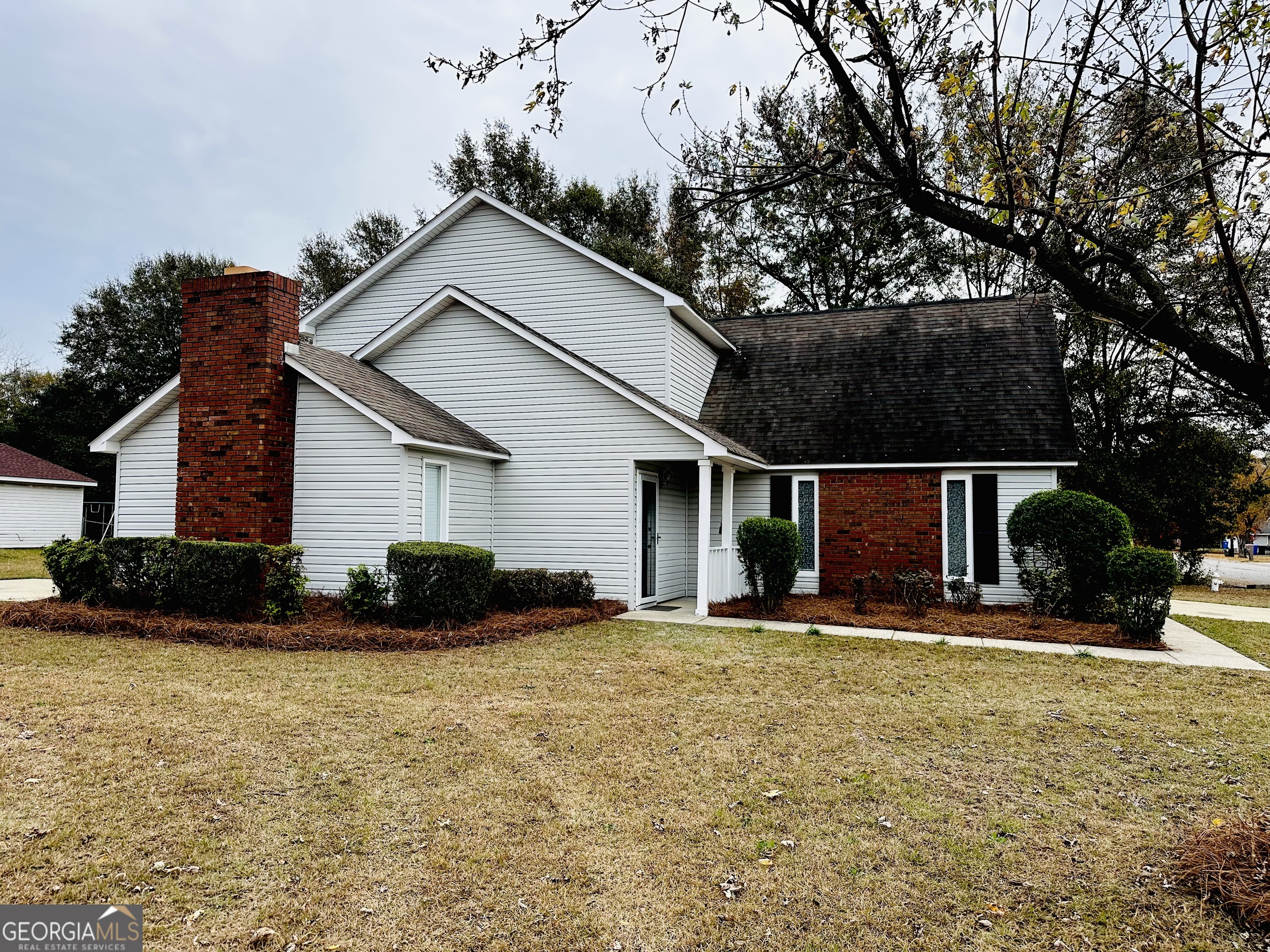 1610 Lance Drive Dublin, GA 31021 - Photo 1 of 38 a front view of house with yard and green space