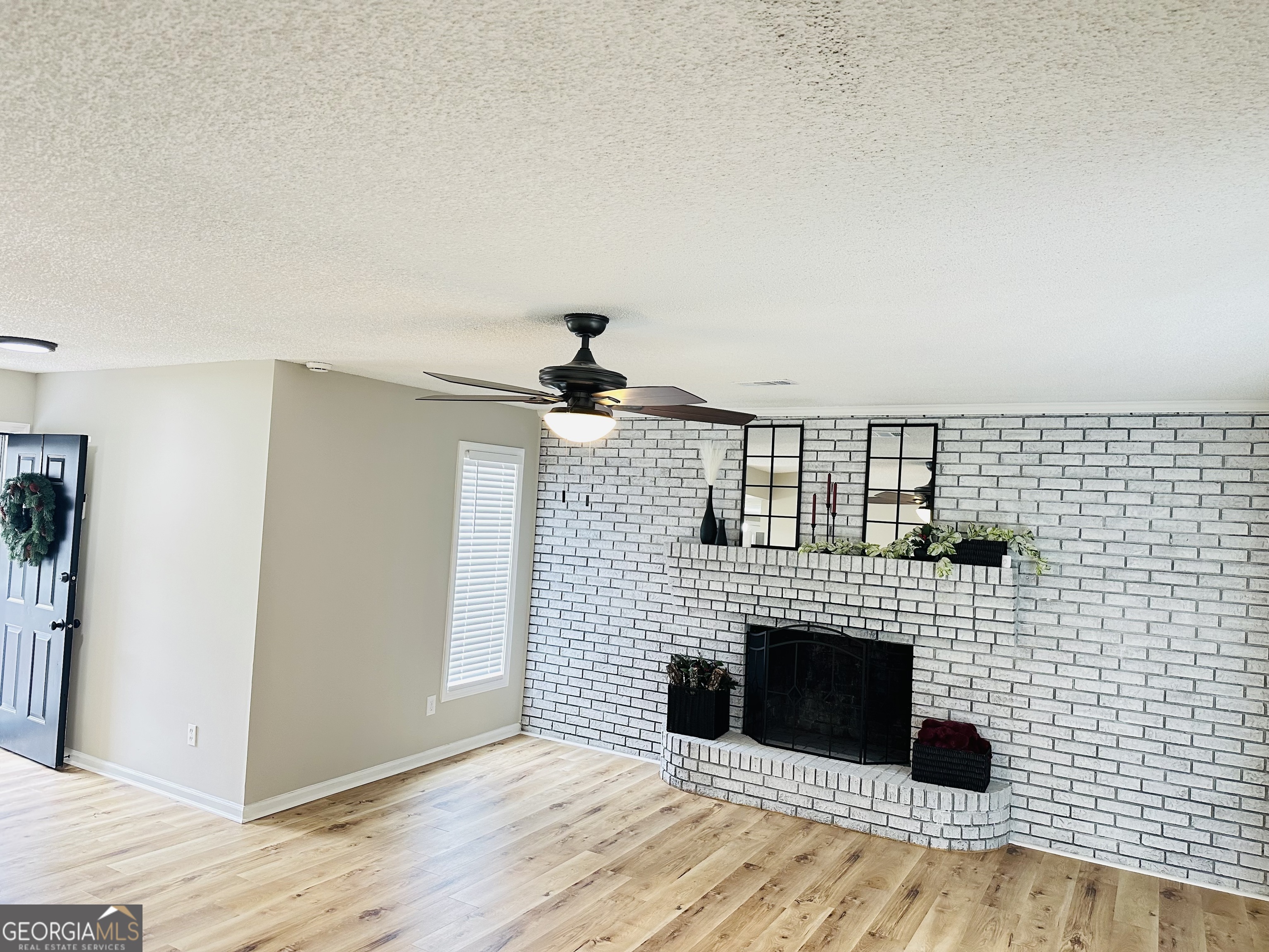 1610 Lance Drive Dublin, GA 31021 - Photo 7 of 38 a view of a livingroom with a fireplace