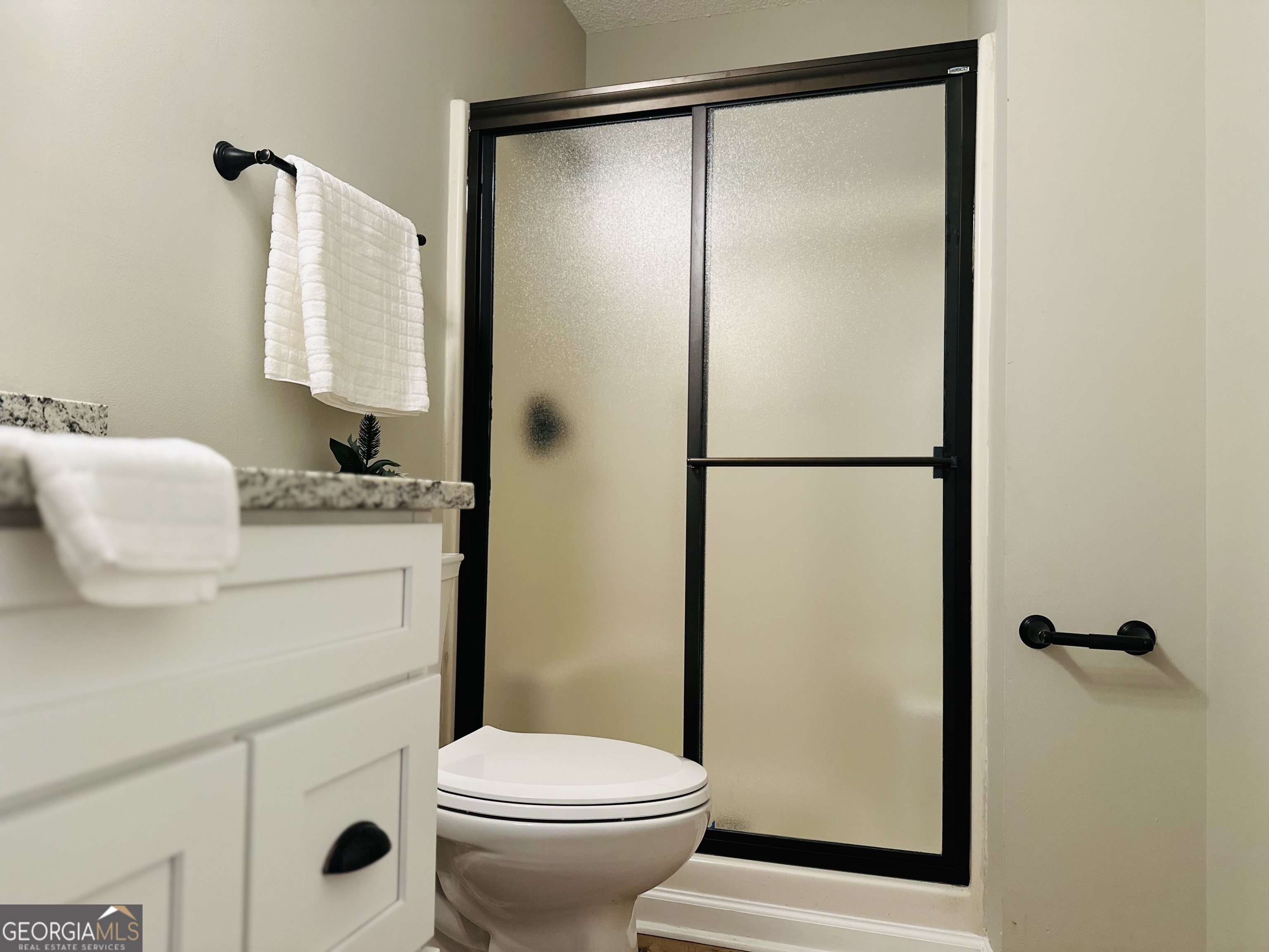 1610 Lance Drive Dublin, GA 31021 - Photo 10 of 38 a bathroom with a sink toilet and shower
