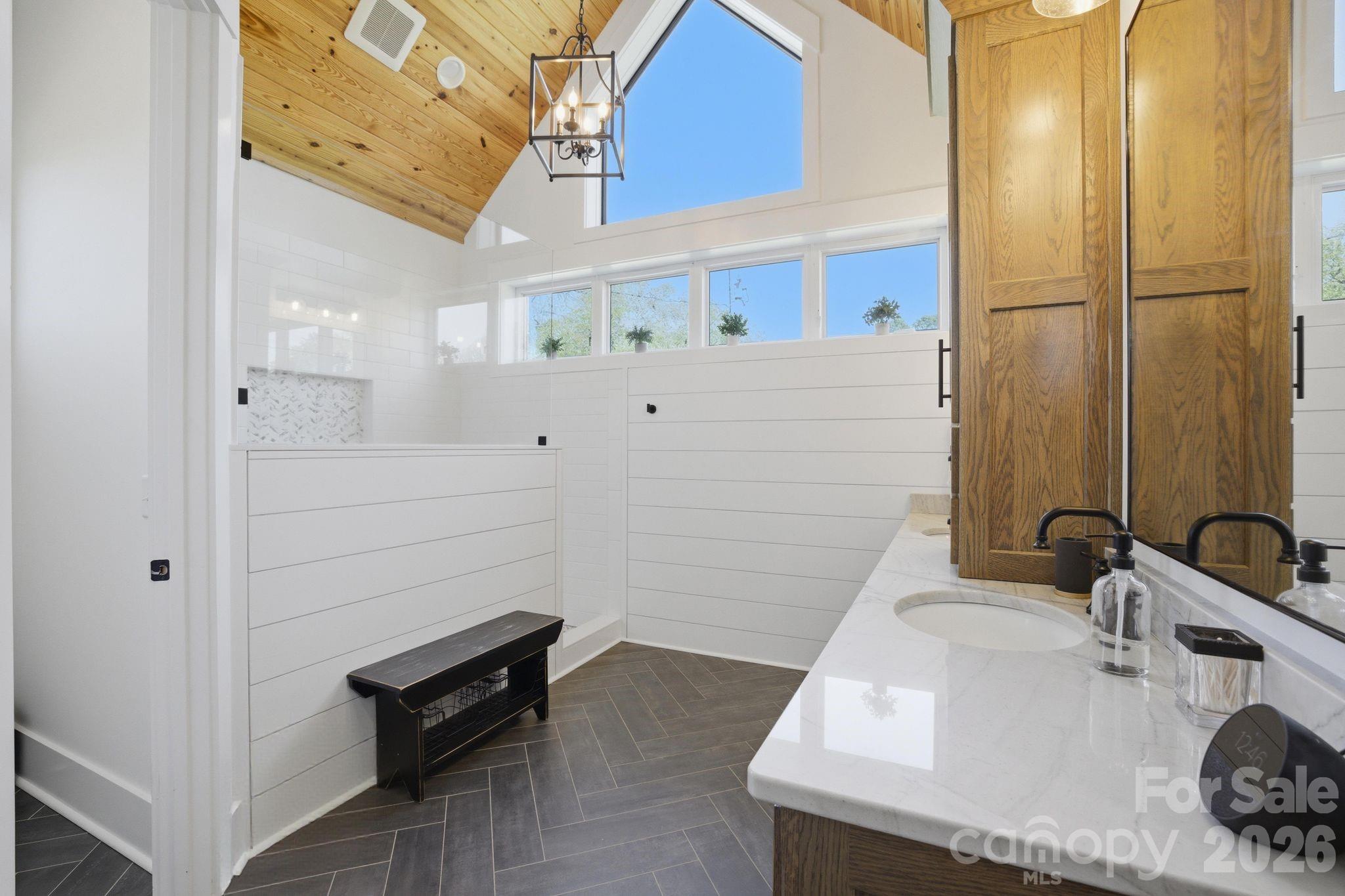 7748 Harbor Lane Denver, NC 28037 - Photo 21 of 42 a bathroom with a sink and a mirror