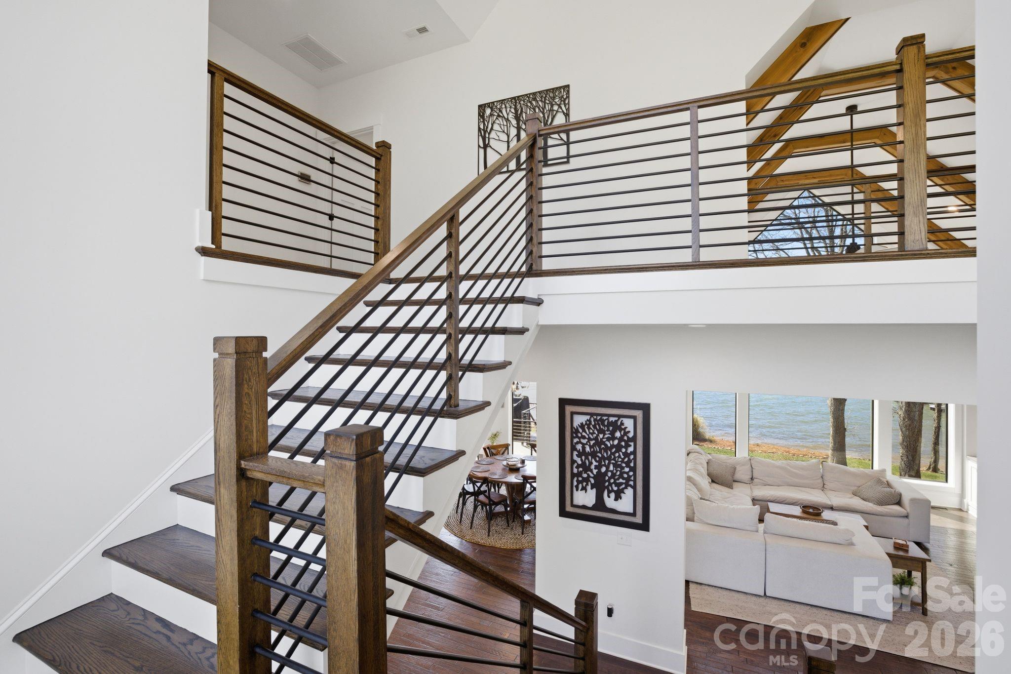 7748 Harbor Lane Denver, NC 28037 - Photo 28 of 42 a view of a livingroom with furniture and staircase