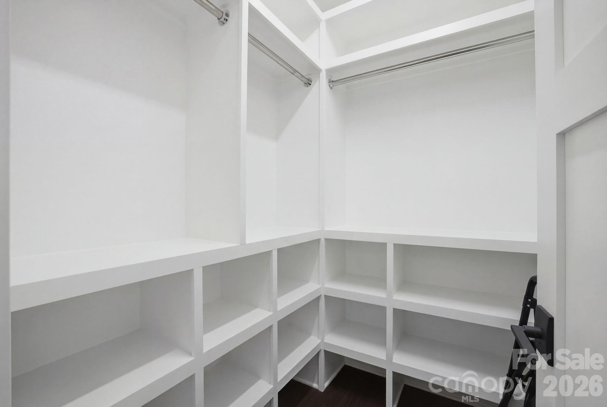7748 Harbor Lane Denver, NC 28037 - Photo 36 of 42 a view of an empty walk in closet