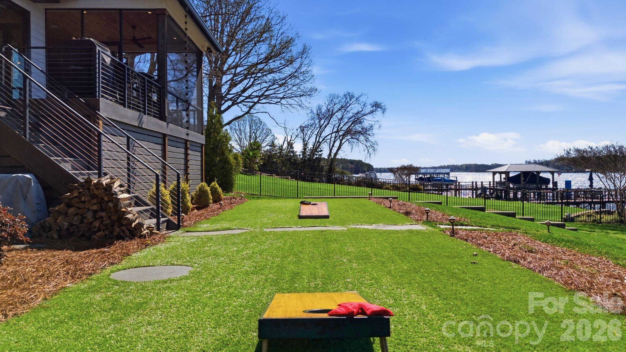 7748 Harbor Lane Denver, NC 28037 - Photo 40 of 42 a view of yard with swimming pool and green space