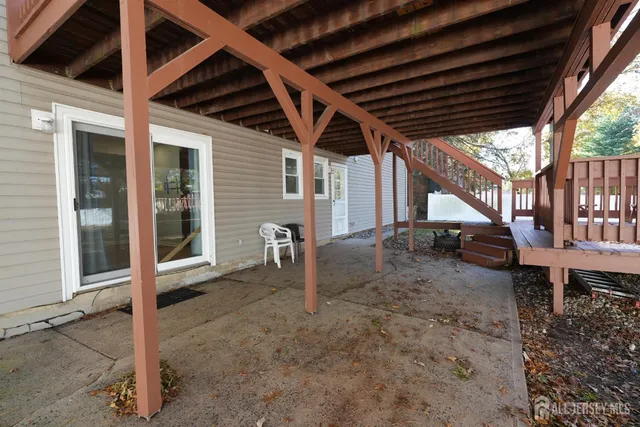 a view of stairs and a patio