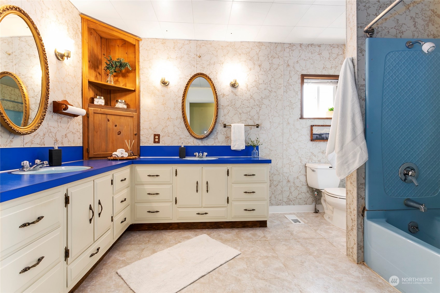 2219 Mt Baker Highway Bellingham, WA 98226 - Photo 17 of 39 a spacious bathroom with a double vanity sink a mirror and a bathtub