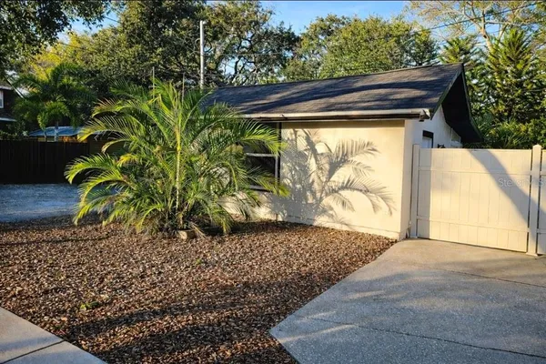 a wooden door in front of a house