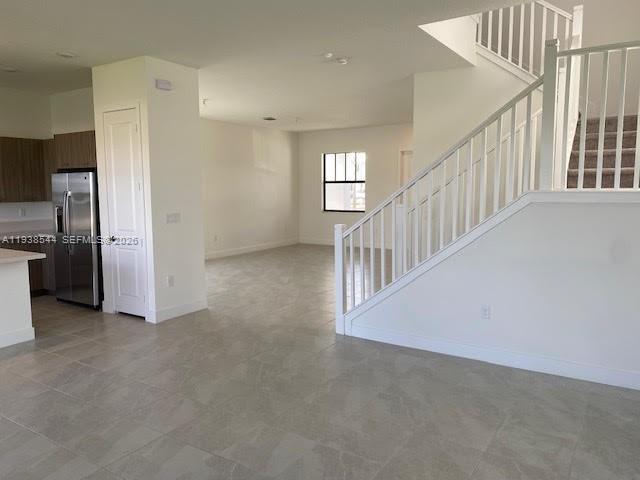 4435 Southwest 174th Avenue Miramar, FL 33029 - Photo 12 of 34 a view of a hallway with staircase