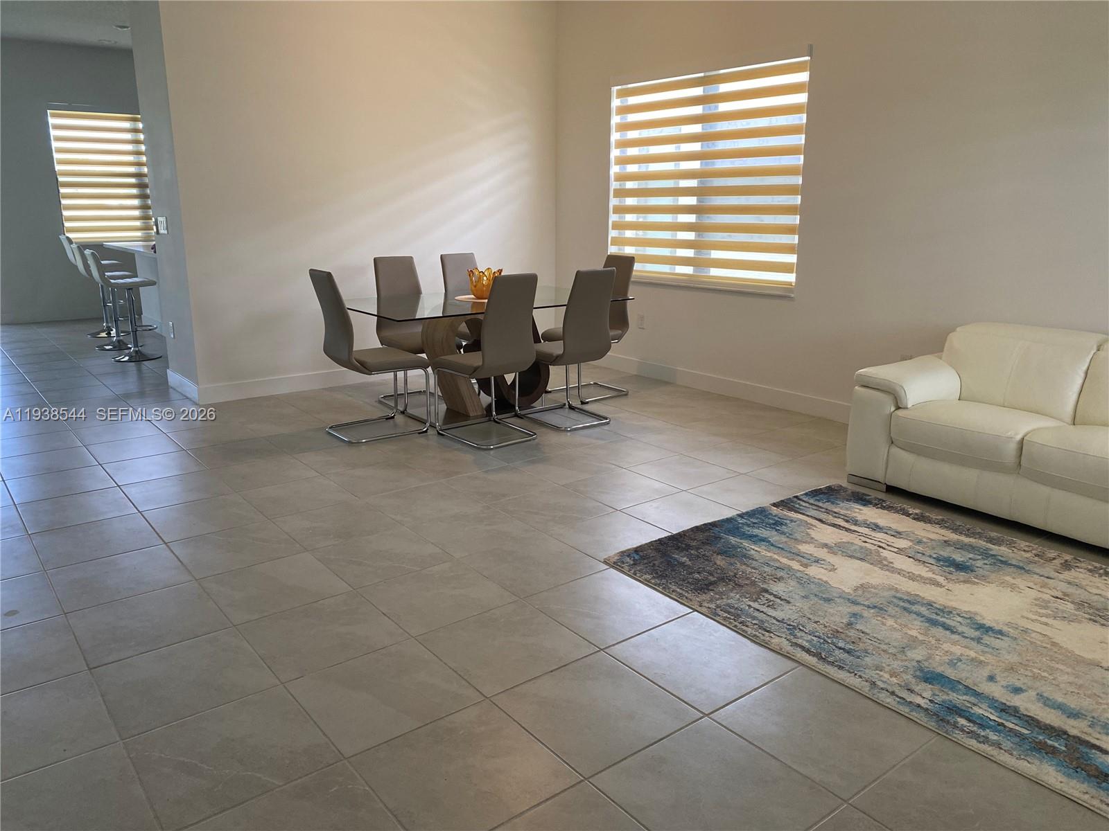 4435 Southwest 174th Avenue Miramar, FL 33029 - Photo 15 of 34 a living room with furniture and a window