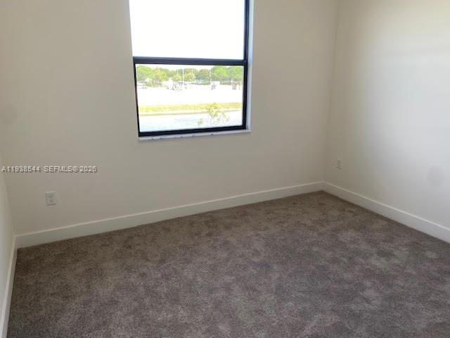 4435 Southwest 174th Avenue Miramar, FL 33029 - Photo 24 of 34 an empty room with a window