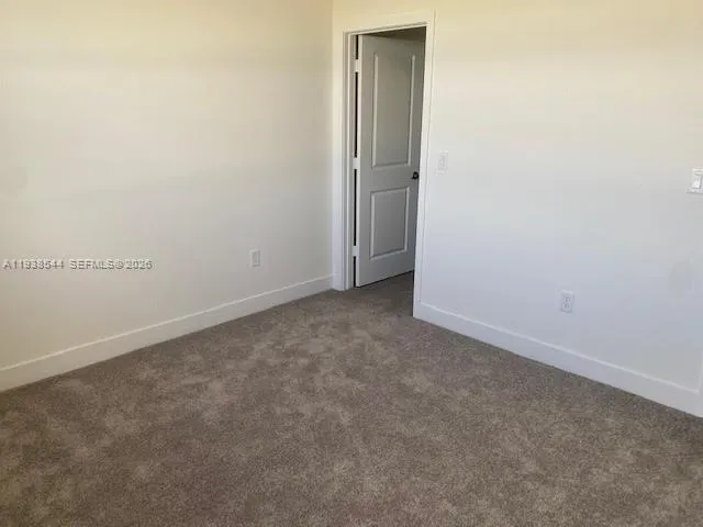 an empty room with an entryway