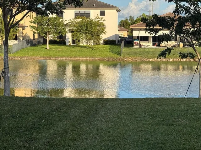 front view of a house with a swimming pool
