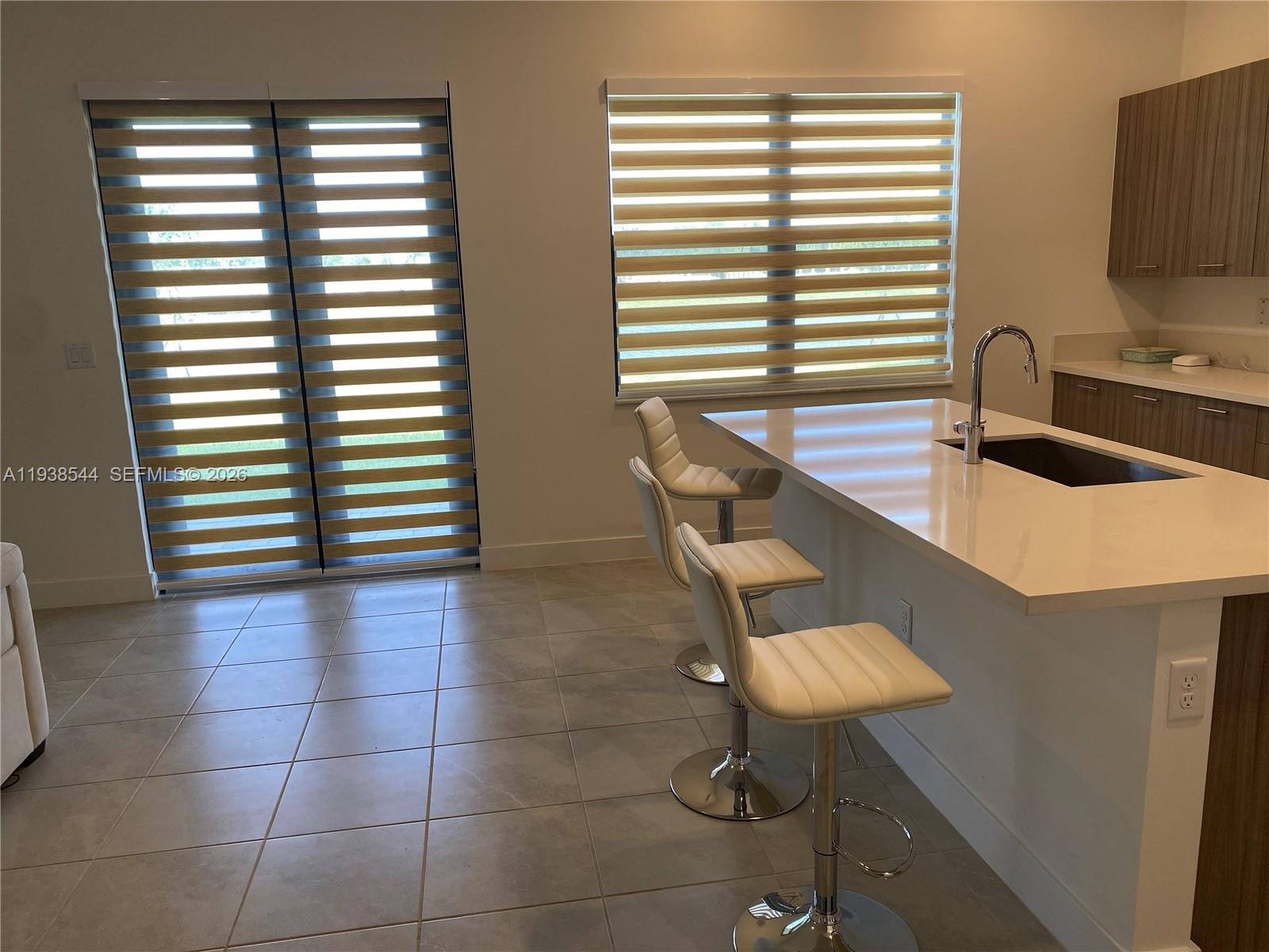 4435 Southwest 174th Avenue Miramar, FL 33029 - Photo 7 of 34 a view of a workspace with a window