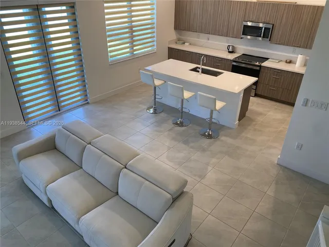 a workspace with furniture and window