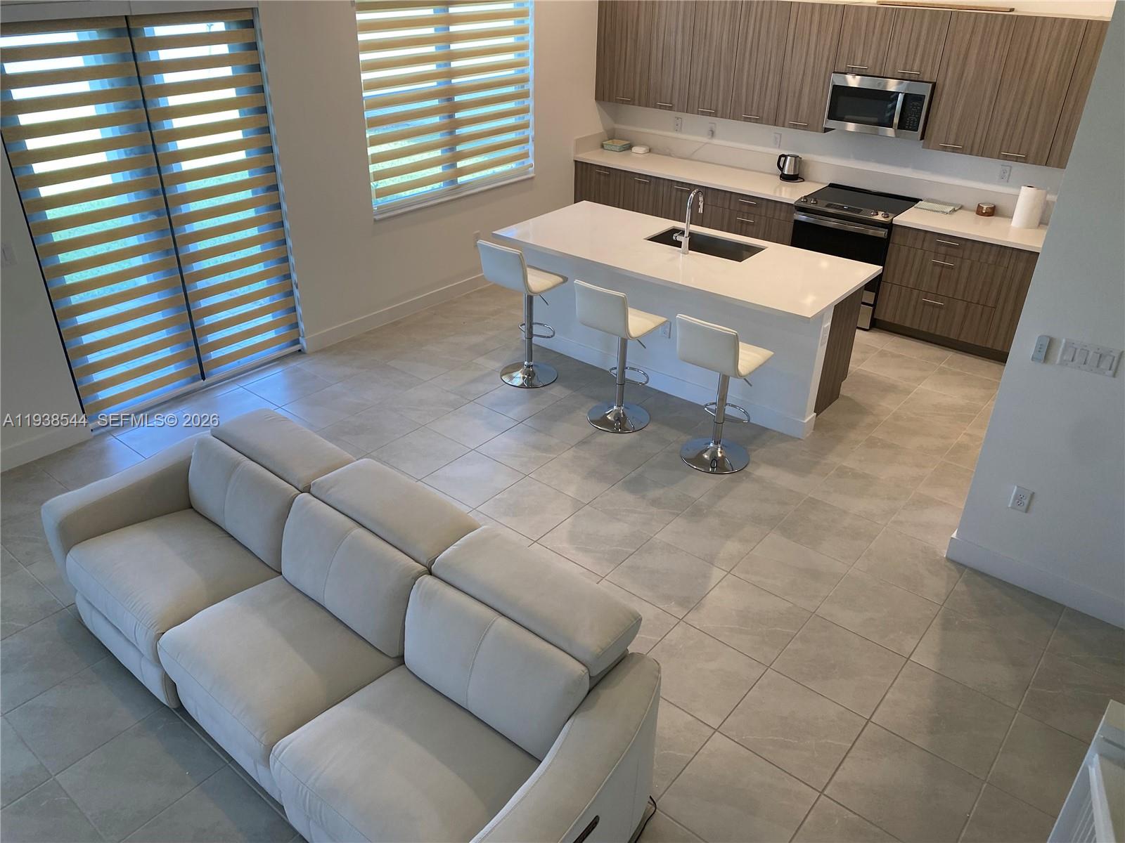 4435 Southwest 174th Avenue Miramar, FL 33029 - Photo 10 of 34 a workspace with furniture and window