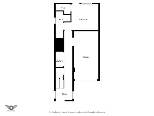 a picture of a bathroom with a shower