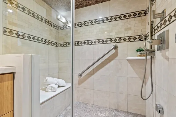 a spacious bedroom with a bed and a table