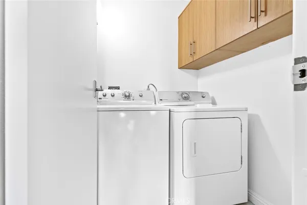 a view of an outdoor space and tennis court