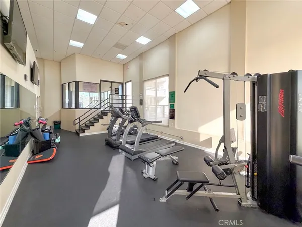 a view of a room with gym equipment