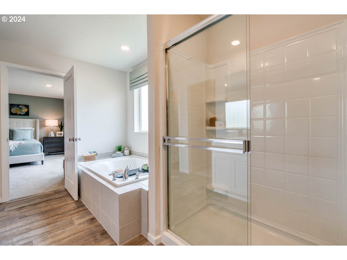 2797 U Street Springfield, OR 97477 - Photo 27 of 29 a bathroom with a bathtub sink and view of living room