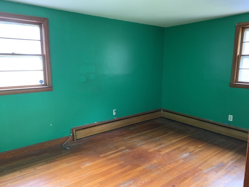 12 Pine Avenue Randolph, MA 02368 - Photo 12 of 18 a view of a room with a window and a ceiling fan