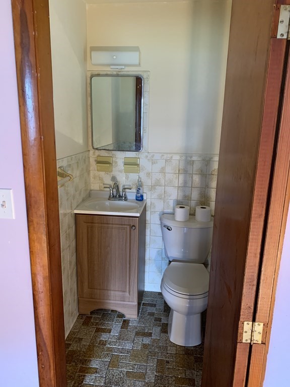 12 Pine Avenue Randolph, MA 02368 - Photo 14 of 18 a bathroom with a toilet and a sink