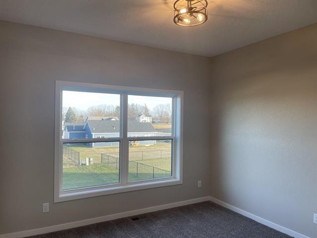 14168 Prairie Commons Lane South Beloit, IL 61080 - Photo 13 of 15 an empty room with a window