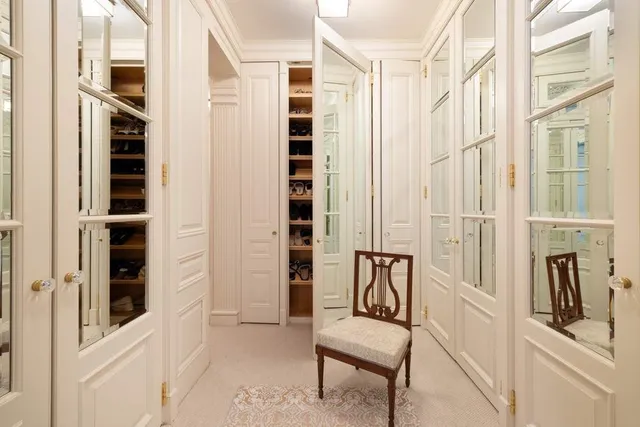 a view of a entryway with wooden floor and windows
